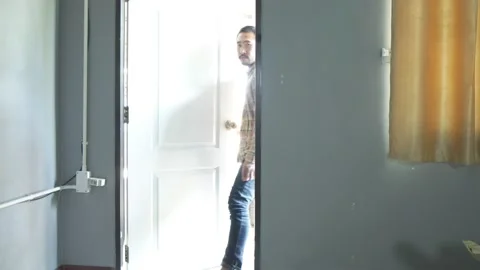 Open the door in coming your room Stock Footage 146304504