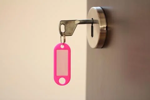 Open door with key Stock Photos