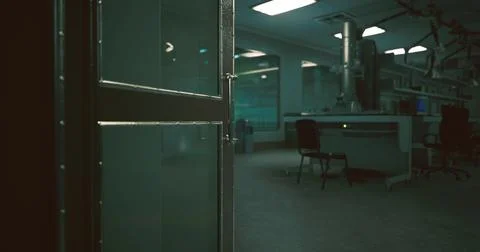 Open door revealing an empty office space in a modern building Ilustración de archivo