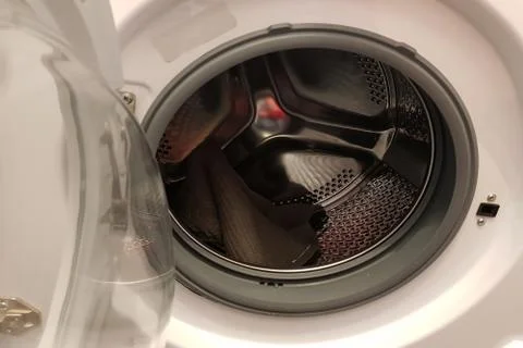 Open door of a washing machine Stock Photos