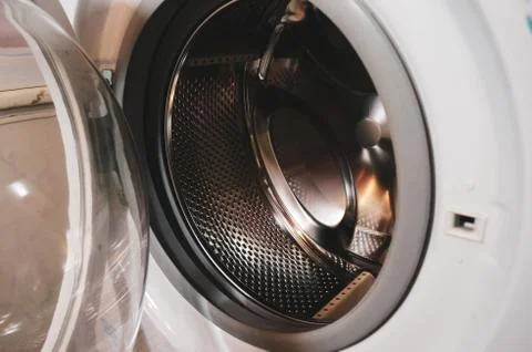Open door of the washing machine Stock Photos