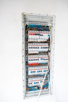 Open Electrical Panel with Circuit Breakers and Color Coded Wiring Stock Photos