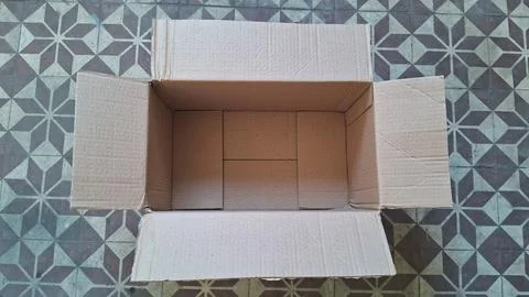 Open empty brown cardboard box viewed from a high angle Stock Photos