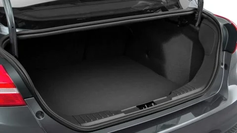 Open empty car trunk close up Black Sapphire Metallic 2016 Ford Focus S Stock Footage 159859990