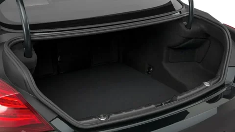 Open empty car trunk close up Granite Metallic Clear Coat 2016 BMW 6-series M6 Stock Footage 159883437