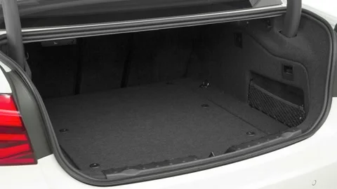 Open empty car trunk close up Ruby 2016 BMW 3-series 330e Stock Footage 159883678