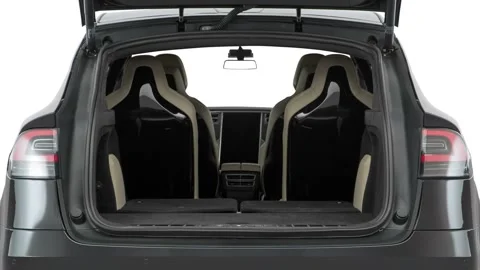 Open empty car trunk close up Gun Metallic 2016 Tesla Model X P90D Stock Footage 159889331