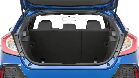 Open empty car trunk close up Summit White 2017 Honda Civic Hatchback EX Stock Footage 159917480