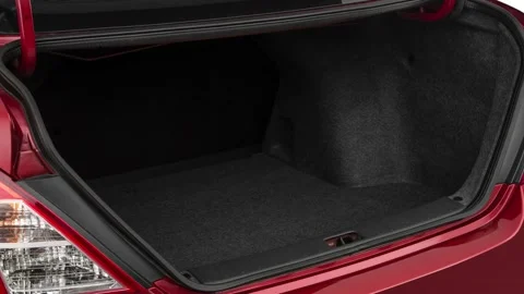 Open empty car trunk close up Lunar Silver Metallic 2018 Nissan Versa S Plus Stock Footage 159979884