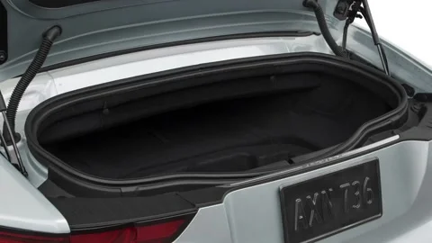 Open empty car trunk close up Arctic Gray 2018 Jaguar F-Type SE Stock Footage 159994886