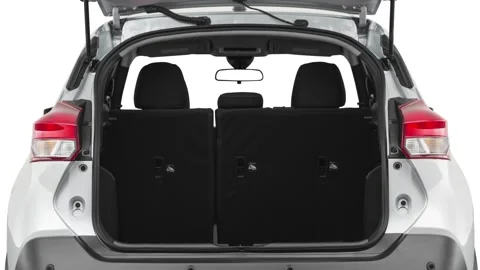 Open empty car trunk close up Diamond Black Metallic 2020 Nissan Kicks SV CUV Stock Footage 160104664