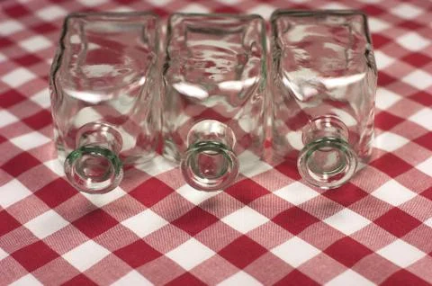 Open empty glass bottles. Close-up Stock Photos