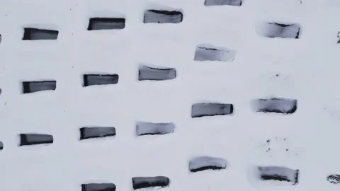 Open empty graves among the snowy field Stock Footage 169881872
