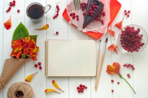 Open empty notebook with cup of coffee Stock Photos
