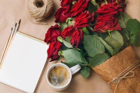 Open empty notebook with cup of coffee Stock Photos