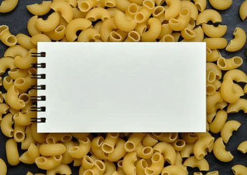 Open Empty Notebook on Macaroni Pasta Background, Copy Space for Text Foto stock