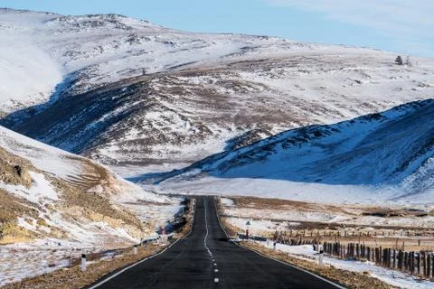 Open empty road with beautiful rode side view at countryside in winter Stock Photos