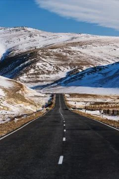 Open empty road with beautiful rodeside view at countryside in winter Stock Photos