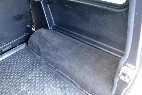 Open empty side part of trunk arch of a car suv close-up after washing and va Stock Photos