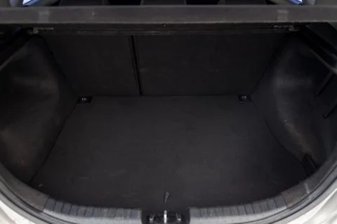 Open empty trunk of a car suv close-up after washing and vacuuming with a cle Stock Photos