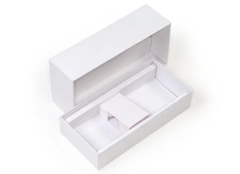Open empty white rectangular cardboard packing box on white background Stockfoto's
