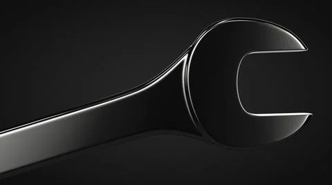 Open-end spanner close-up. Dark background. Foto stock