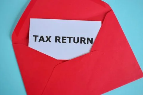 Open envelope with message TAX RETURN: Business concept for Accounting Money Stock Photos