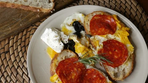 Open face breakfast toast with fried egg chorizo sausage Видео 334850837