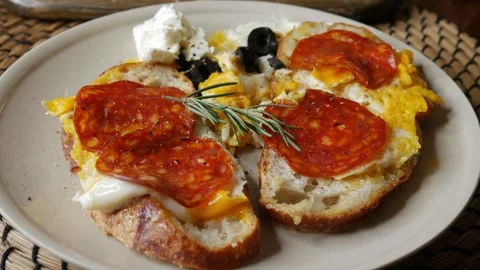 Open face breakfast toast with fried egg chorizo sausage Stock-Footage 335583960