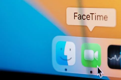 Open FaceTime app in macbook dock Stock Photos