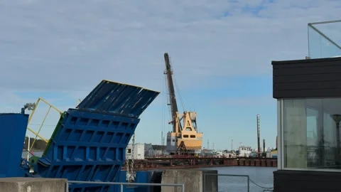Open Ferry Ramp and Harbor Crane in Klaipeda Port Stock Footage 336560035