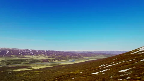 Open Field With the Mountain Ranges and the Majestic Blue Sky at the Background Stock Footage 157374508