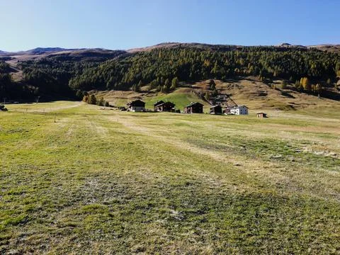 Open Field with Mountains in Background Stock Photos