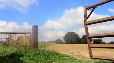 Open field seen through gates Stock Footage 42267468