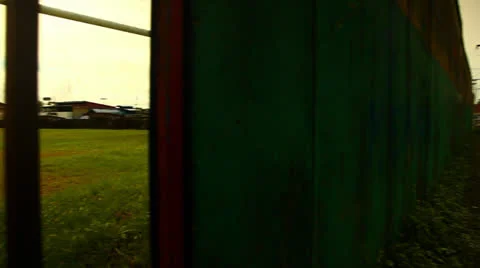 Open Field Through Bars In Costa Rica HD Video Stock Footage 25079883