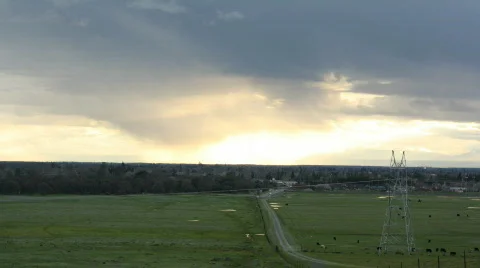 Open Field Under Sun Setting in Clouds.mov Video stock 337438