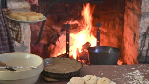 Open Fire Hearth Cooking with Biscuits Stock Footage 217397003