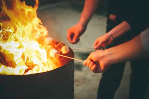 Open fire marshmallow roasting Stock Photos