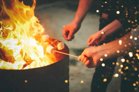 Open fire marshmallow roasting Stock Photos
