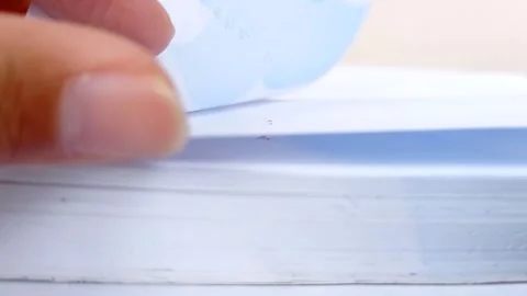 Open the first page of a book Stock Footage 146248030