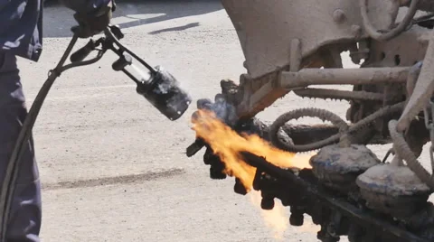 Open flames, heating equipment, road machinery Video stock 63325746
