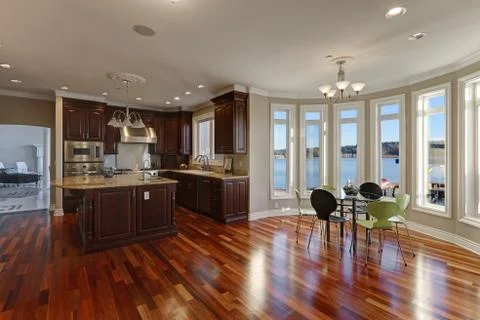 Open floor plan interior of luxury waterfront home:  Stock Photos