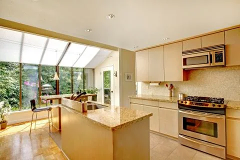 Open floor plan. kitchen and screened porch Stock Photos