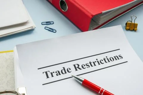 Open folder with document trade restrictions for sanctions. Stock Photos