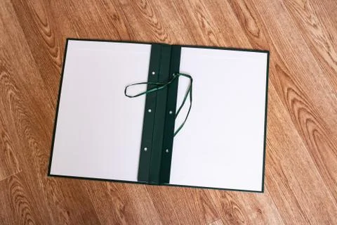 Open folder for documents on wooden table 스톡 사진