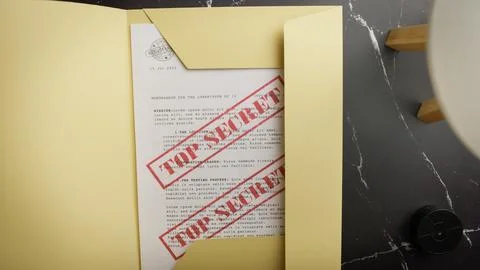 Open a folder of top secret files 写真素材