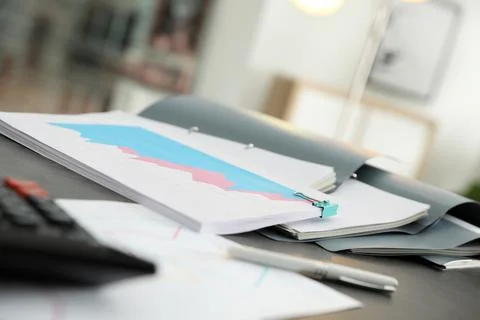 Open folders with documents on office table Stock Photos