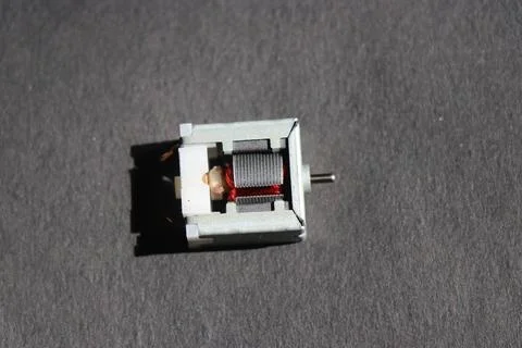 Open frame brushed dc motor with a view of its inside parts Stock Photos