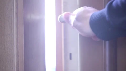 Open the front door Stock Footage 258977545