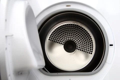 Open front load dryer interior view in close up Stock Photos
